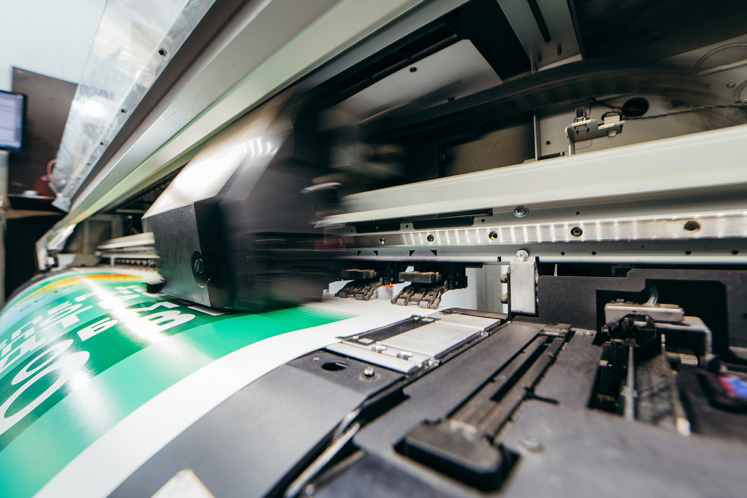Graphic design and advertising concept. Large format plotter, close up